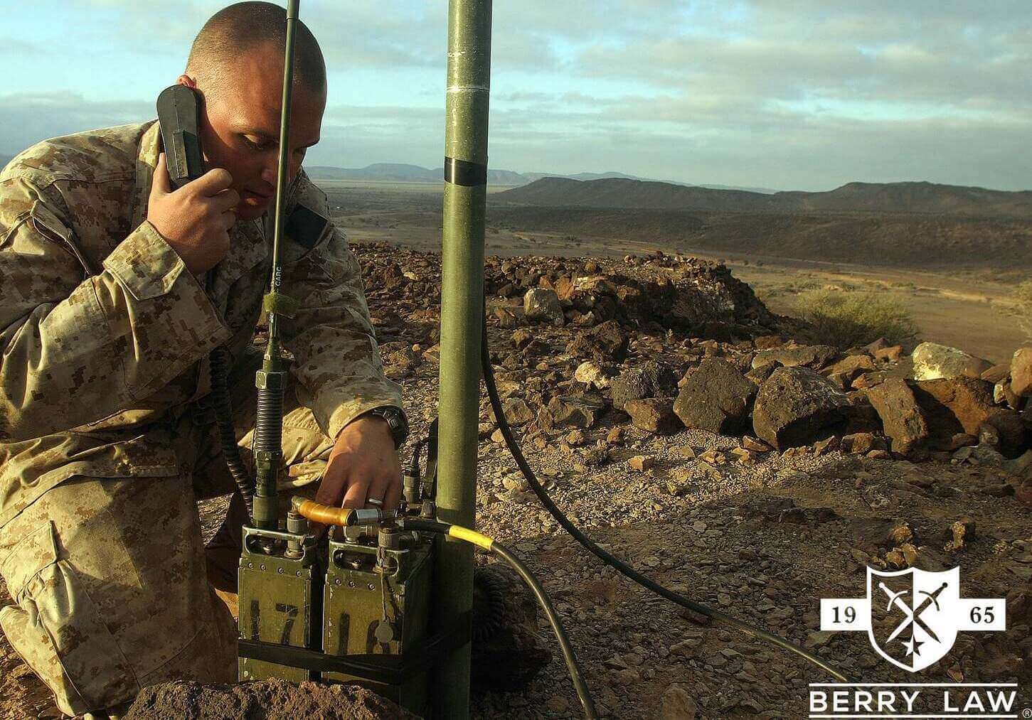 active duty military man on a radio in afghanistan